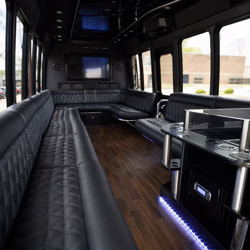 Friends laughing during a Philadelphia party bus celebration