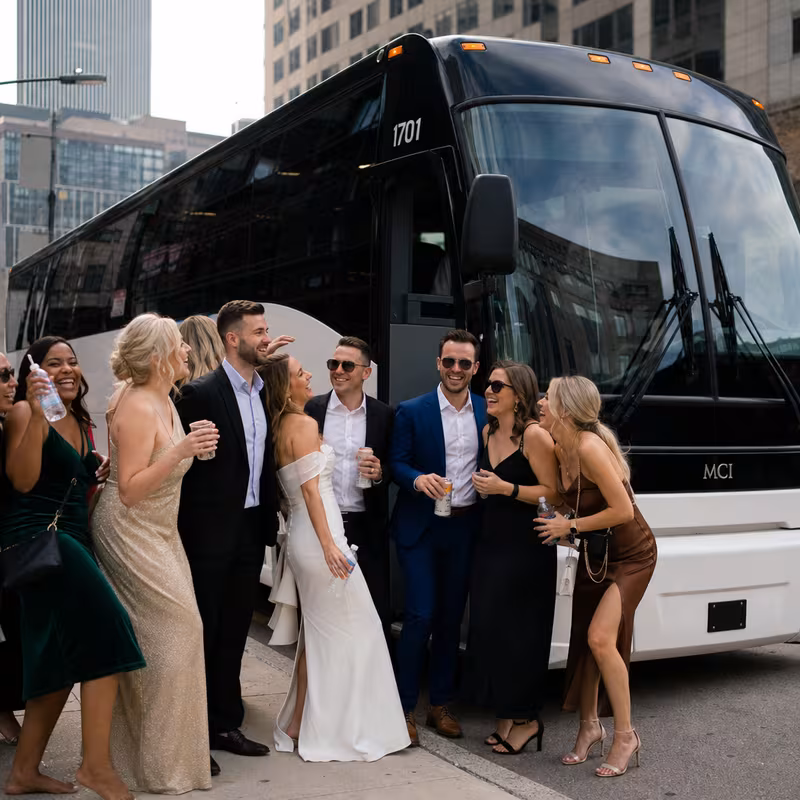 Passengers loading luggage while boarding an Philadelphia group shuttle