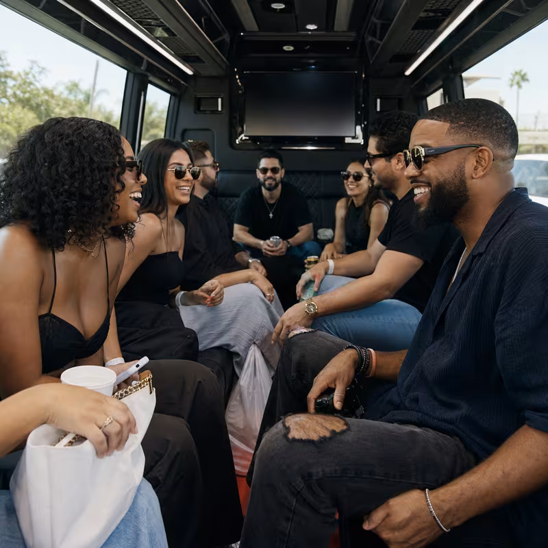 Group boarding a white charter bus for Concert Transportation transportation in Philadelphia