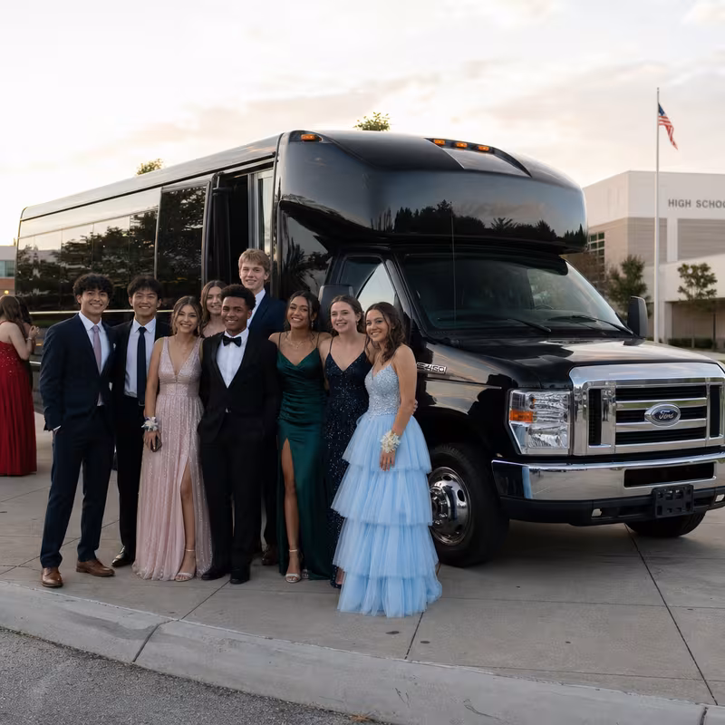 Group boarding a white charter bus for Prom & Homecoming Transportation transportation in Philadelphia