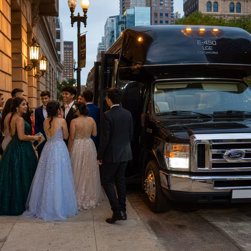Passengers loading luggage while boarding an Philadelphia group shuttle