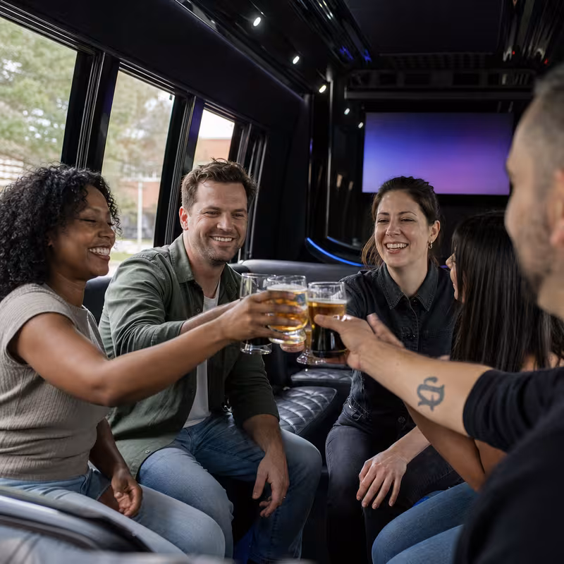 Group boarding a white charter bus for Winery & Brewery Tour Transportation transportation in Philadelphia